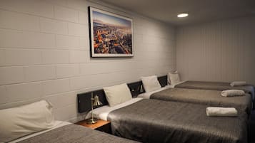 Family Room, Multiple Beds | Premium bedding, individually furnished, desk, bed sheets