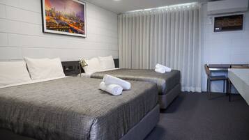 Premium bedding, individually furnished, desk, bed sheets