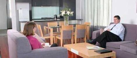 One Bedroom Executive Apartment | Living area | Plasma TV, DVD player