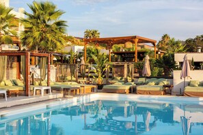 Seasonal outdoor pool, pool umbrellas, pool loungers