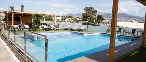 Outdoor pool, sun loungers