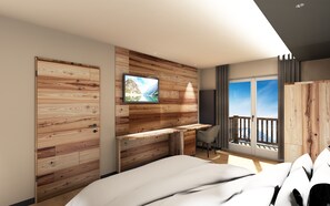 A modern bedroom with a wooden wall panel, a mounted TV, a balcony with a view, and a bed. - Hotel Touring Livigno (Livigno)