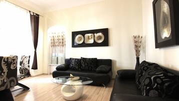 Apartment für 6 Personen | Wohnbereich | 42-Zoll-Flachbildfernseher mit Kabelempfang, Fernseher, DVD-Player