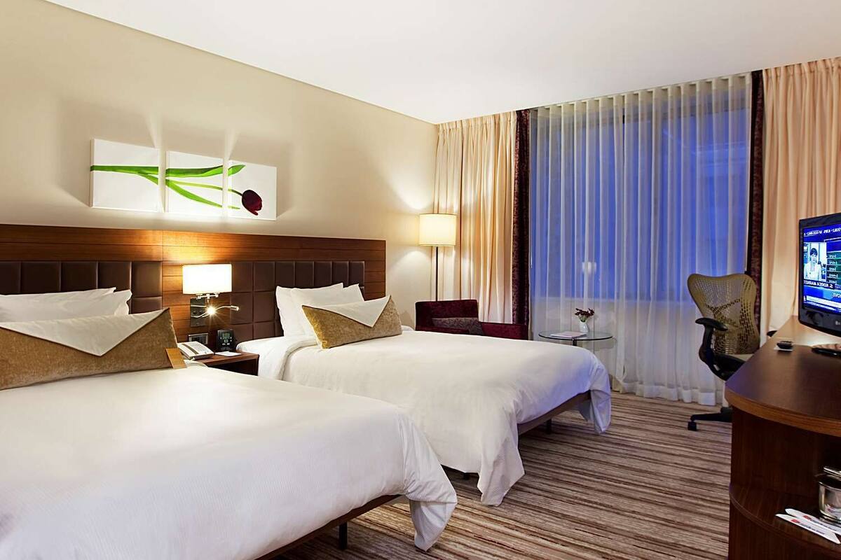 standard room, 2 single beds | minibar, in-room safe, iron/ironing board, rollaway beds