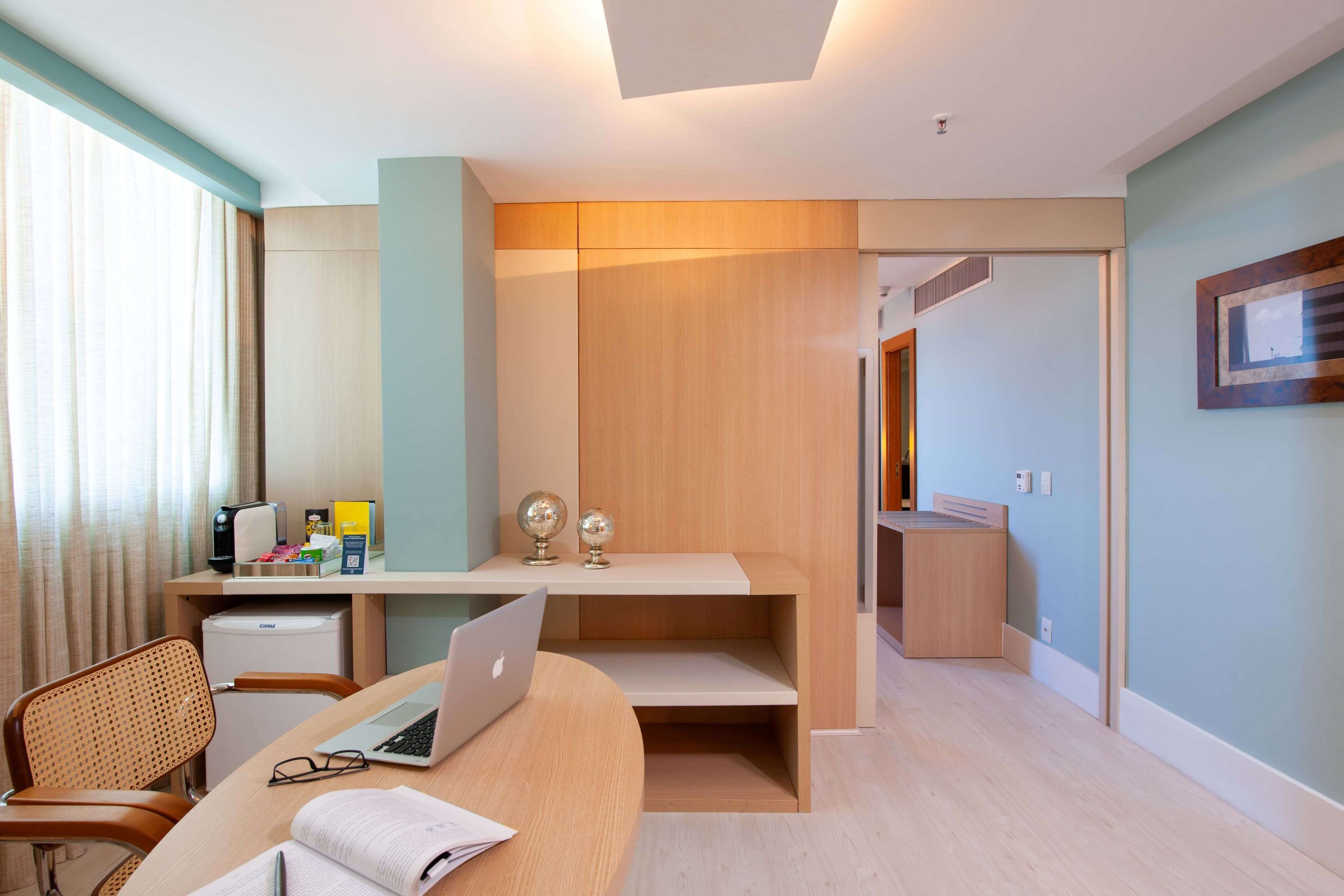 suite, 1 king bed, sea view | 1 bedroom, premium bedding, minibar, in-room safe