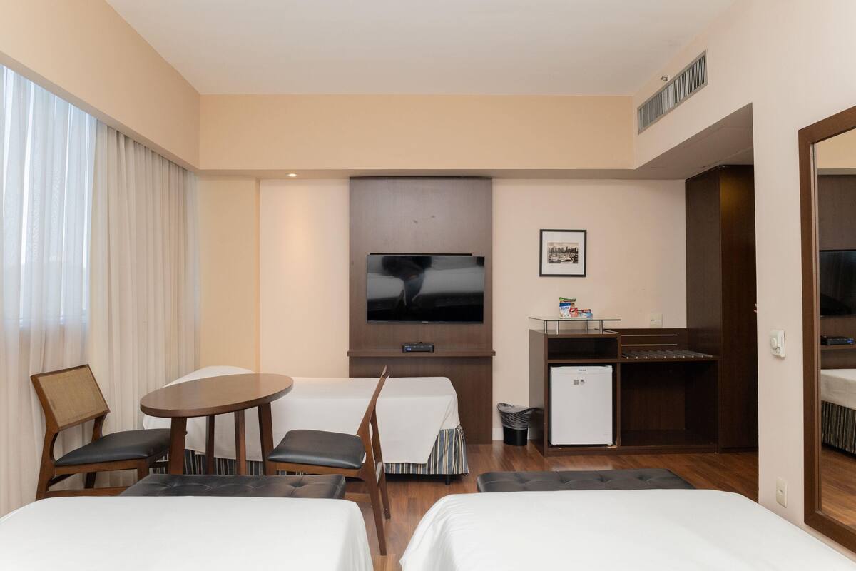 Deluxe Room, 3 Twin Beds, Sea View | Premium bedding, minibar, in-room safe, desk