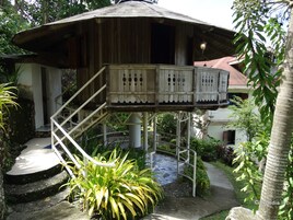 Hillside round hut | Minibar, in-room safe, individually furnished, iron/ironing board
