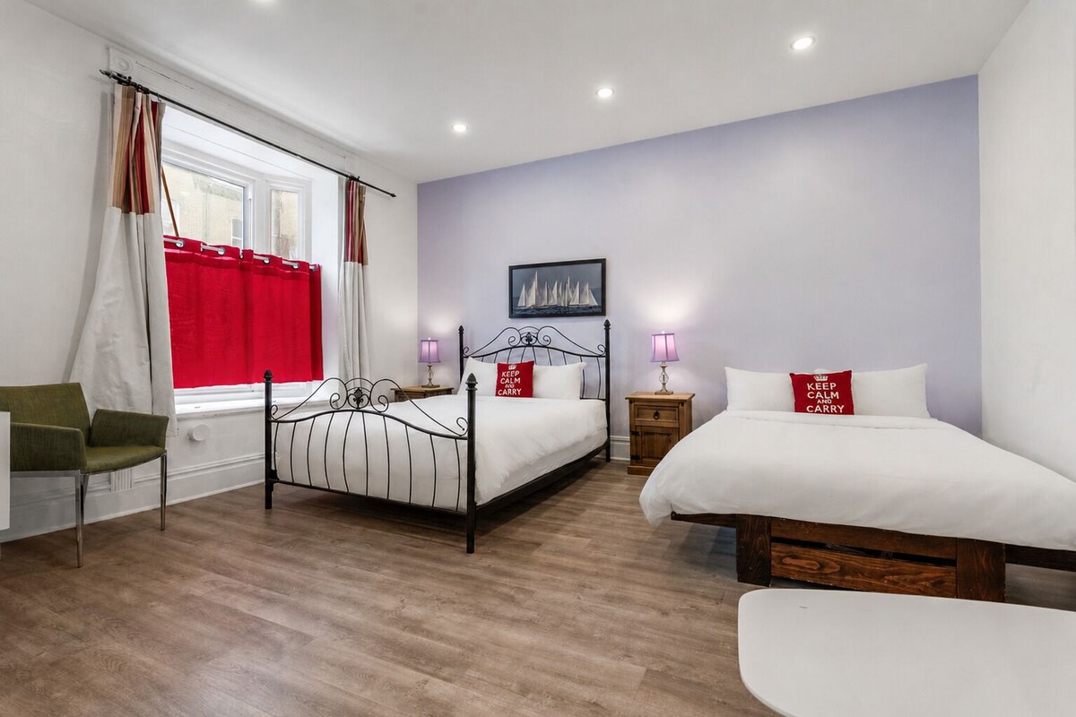 Economy Quadruple Room | Premium bedding, iron/ironing board, cribs (surcharge), WiFi (free)