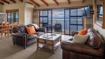 Loft Apartment, 2 Bedrooms | Living area | 42-inch TV with digital channels, DVD player