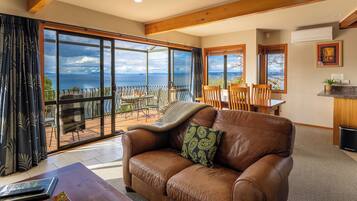 Premium Apartment, Jetted Tub | Living area | 42-inch TV with digital channels, DVD player