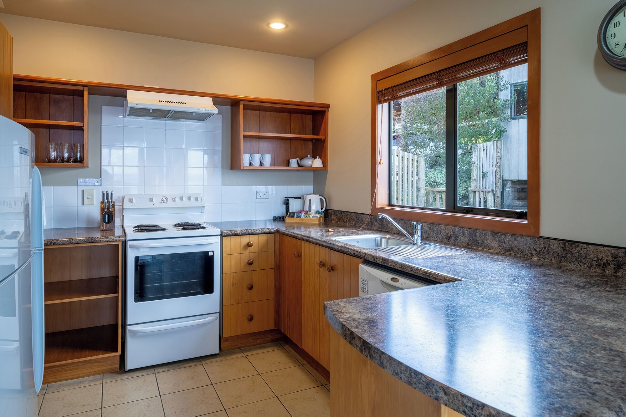 premium apartment | private kitchen | full-sized fridge, microwave, oven, stovetop