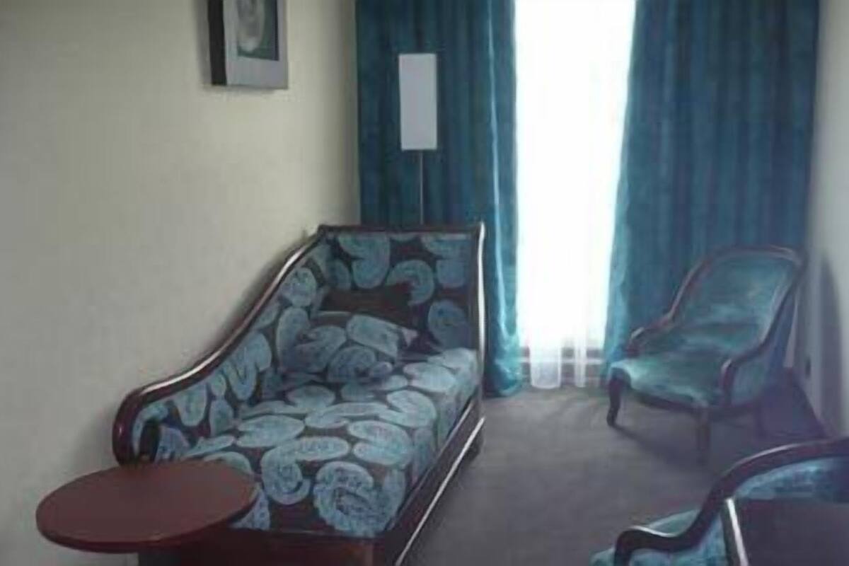 Suite – executive | Oppholdsområde | Flatskjerm-TV
