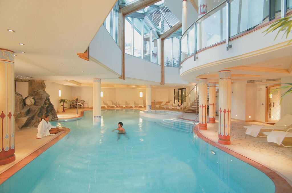 indoor pool, outdoor pool, pool loungers