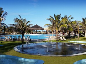 Indoor pool, outdoor pool, pool umbrellas