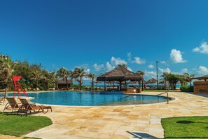 Indoor pool, outdoor pool, pool umbrellas