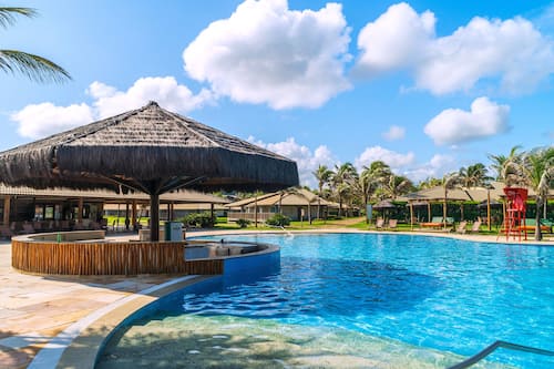 Indoor pool, outdoor pool, pool umbrellas