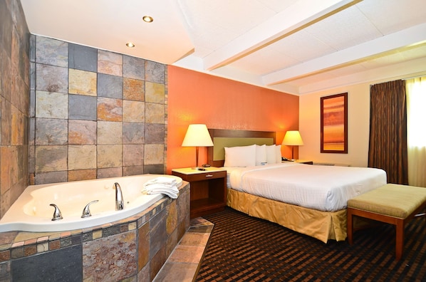 Suite Deluks, 1 Tempat Tidur King, Bebas Asap Rokok | Meja kerja, Wi-Fi gratis, dan seprai linen