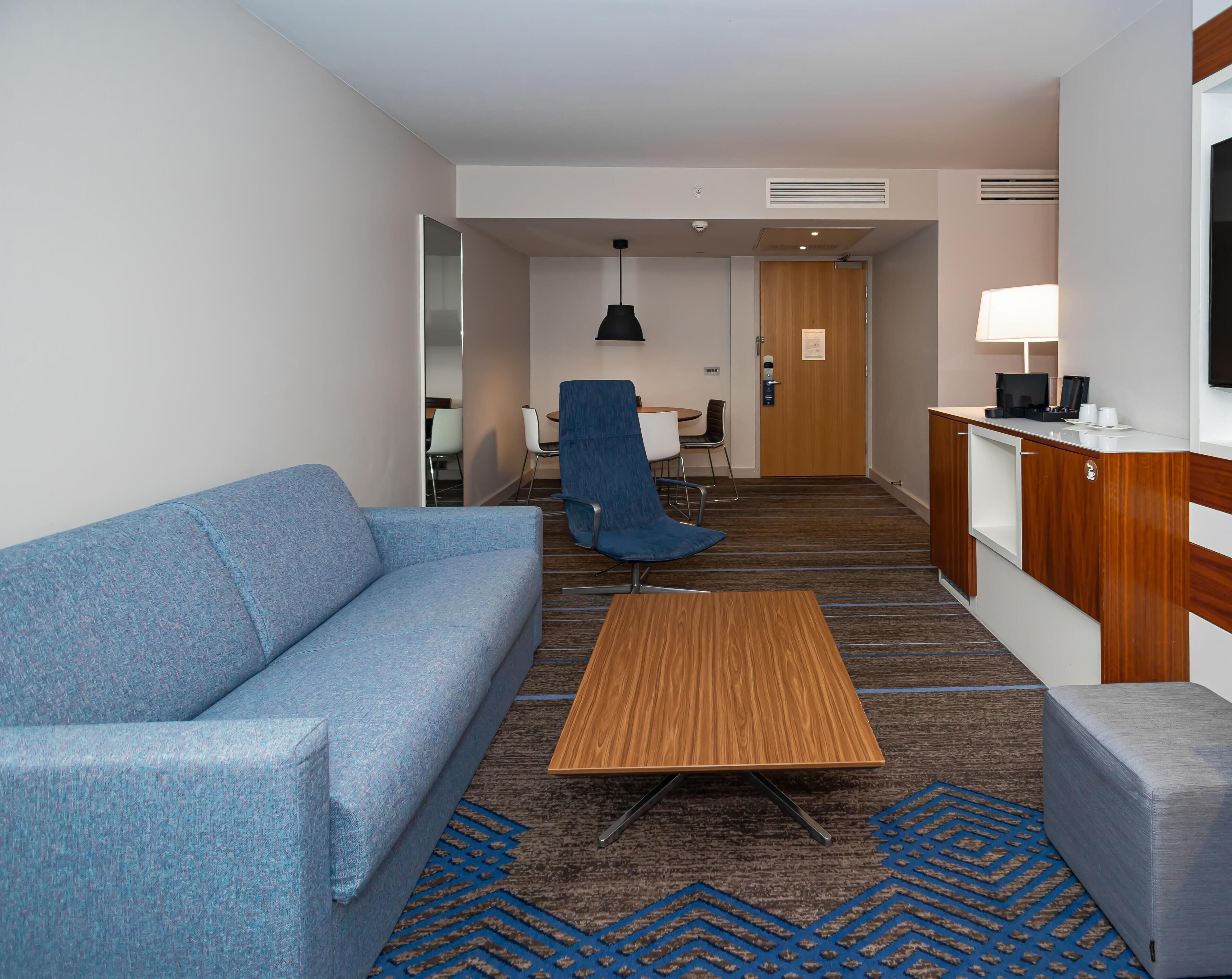 Suite, 1 King Bed, Non Smoking (Atrium) | Living area | 49-inch TV with cable channels, DVD player