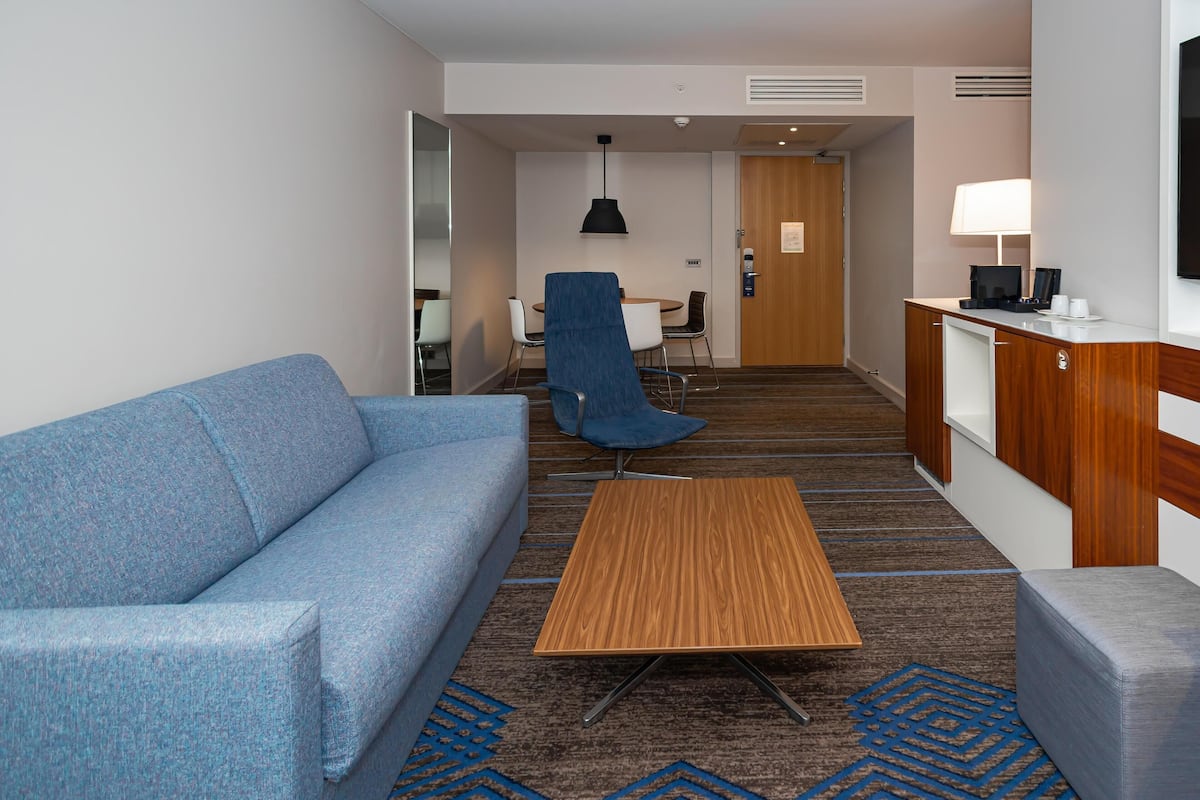 Suite, 1 King Bed, Non Smoking (Atrium) | Living area | 49-inch TV with cable channels, DVD player