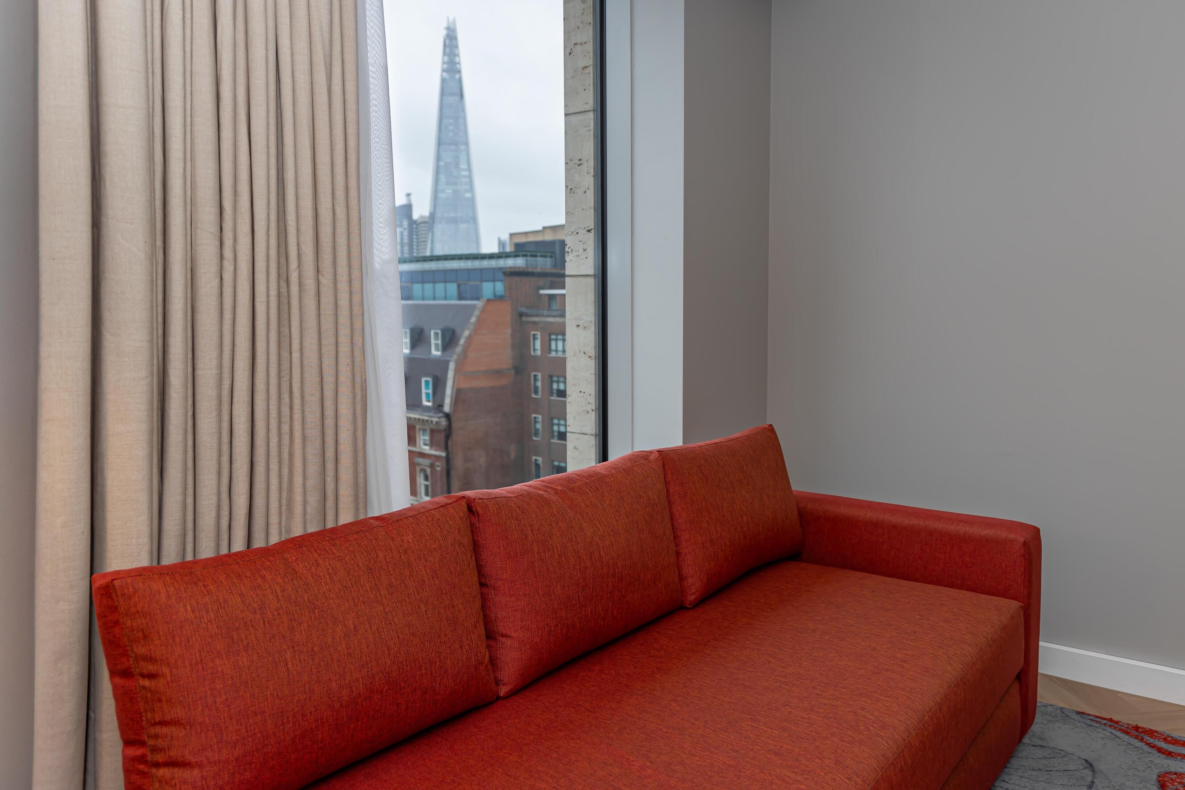 Deluxe-Zimmer, 1 King-Bett und Schlafsofa, Turm | Wohnbereich