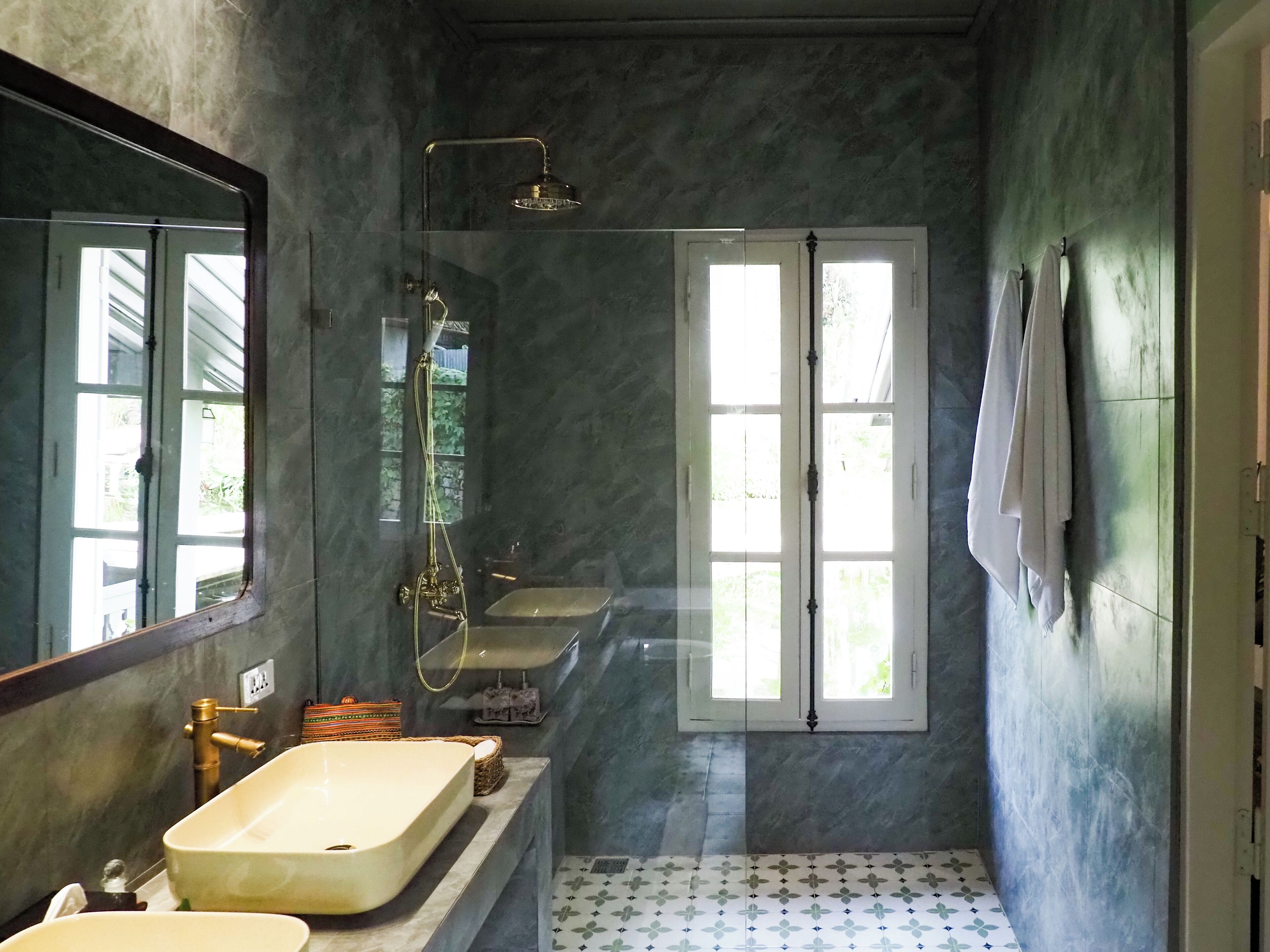 lotus pond pavilion | bathroom | shower, hair dryer, slippers, towels