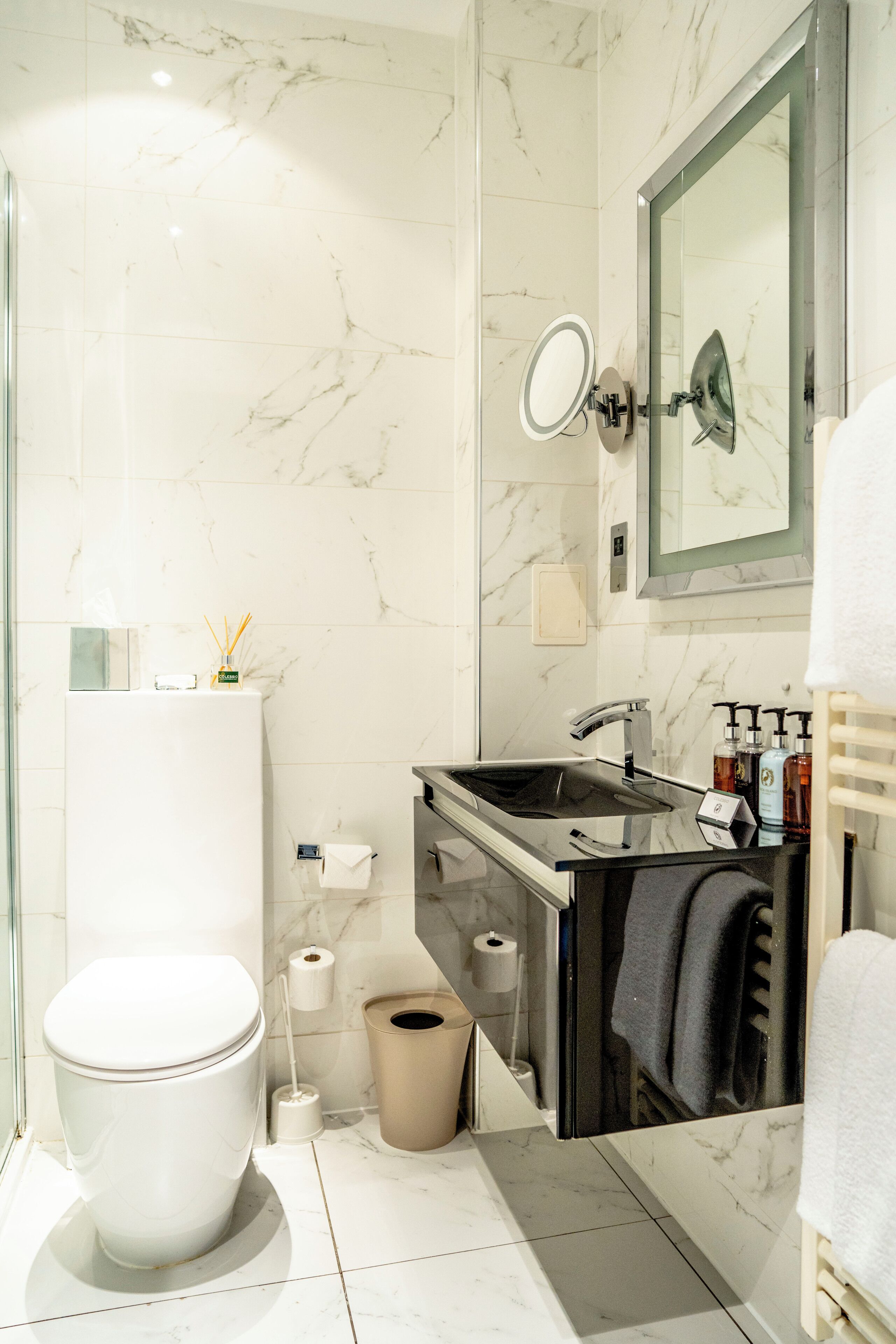double guest room | bathroom | eco-friendly toiletries, hair dryer, towels, soap