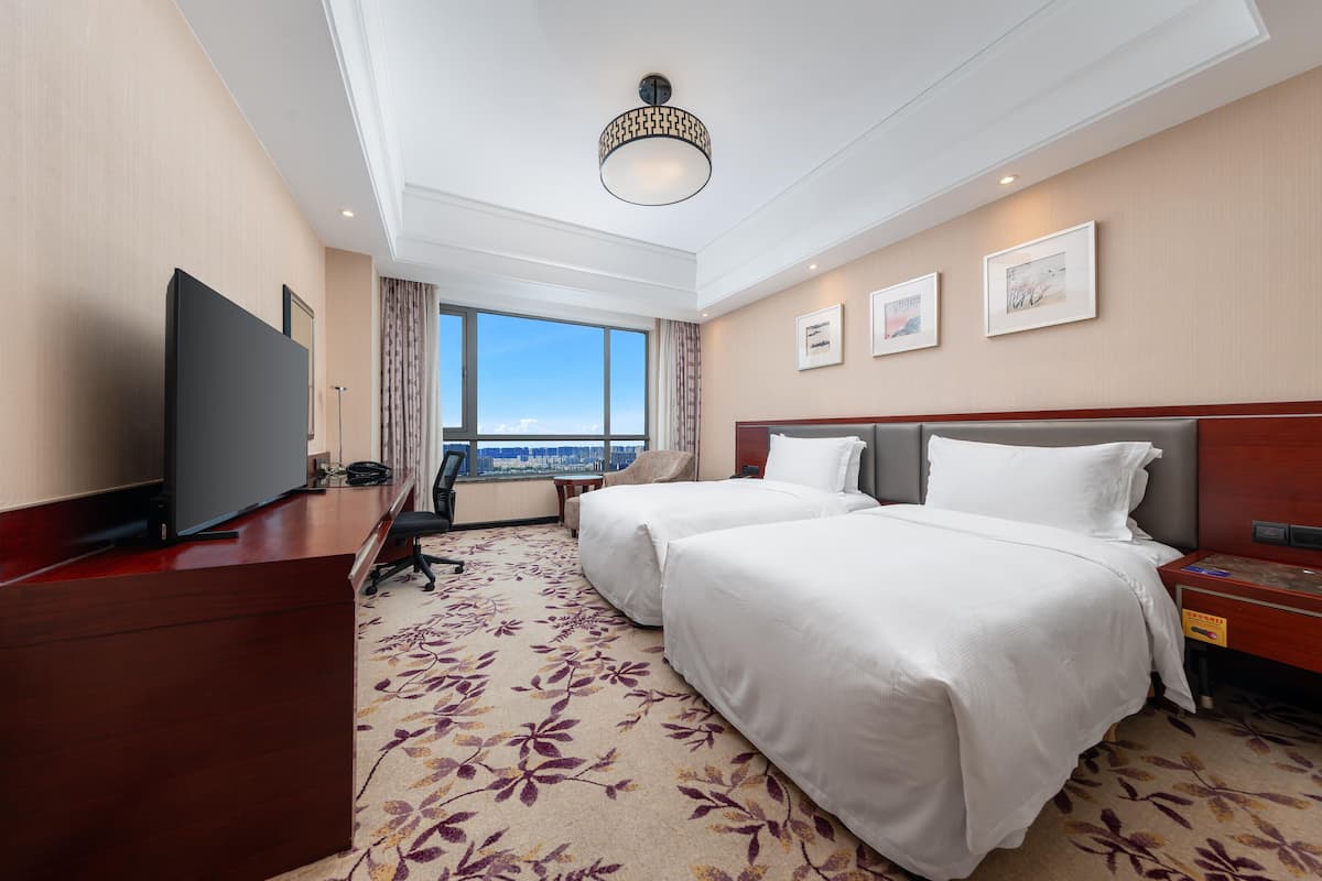 Luxe beddengoed, een minibar, een kluis op de kamer, geluiddichte muren