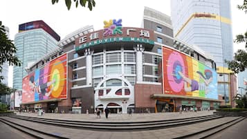 A modern building with a prominent sign for GRANDVIEW MALL.