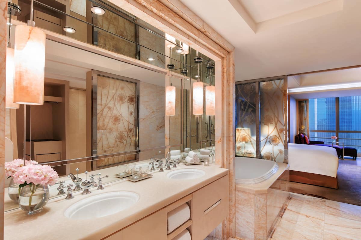 executive suite, 1 bedroom | bathroom | separate bathtub and shower, rainfall showerhead, free toiletries