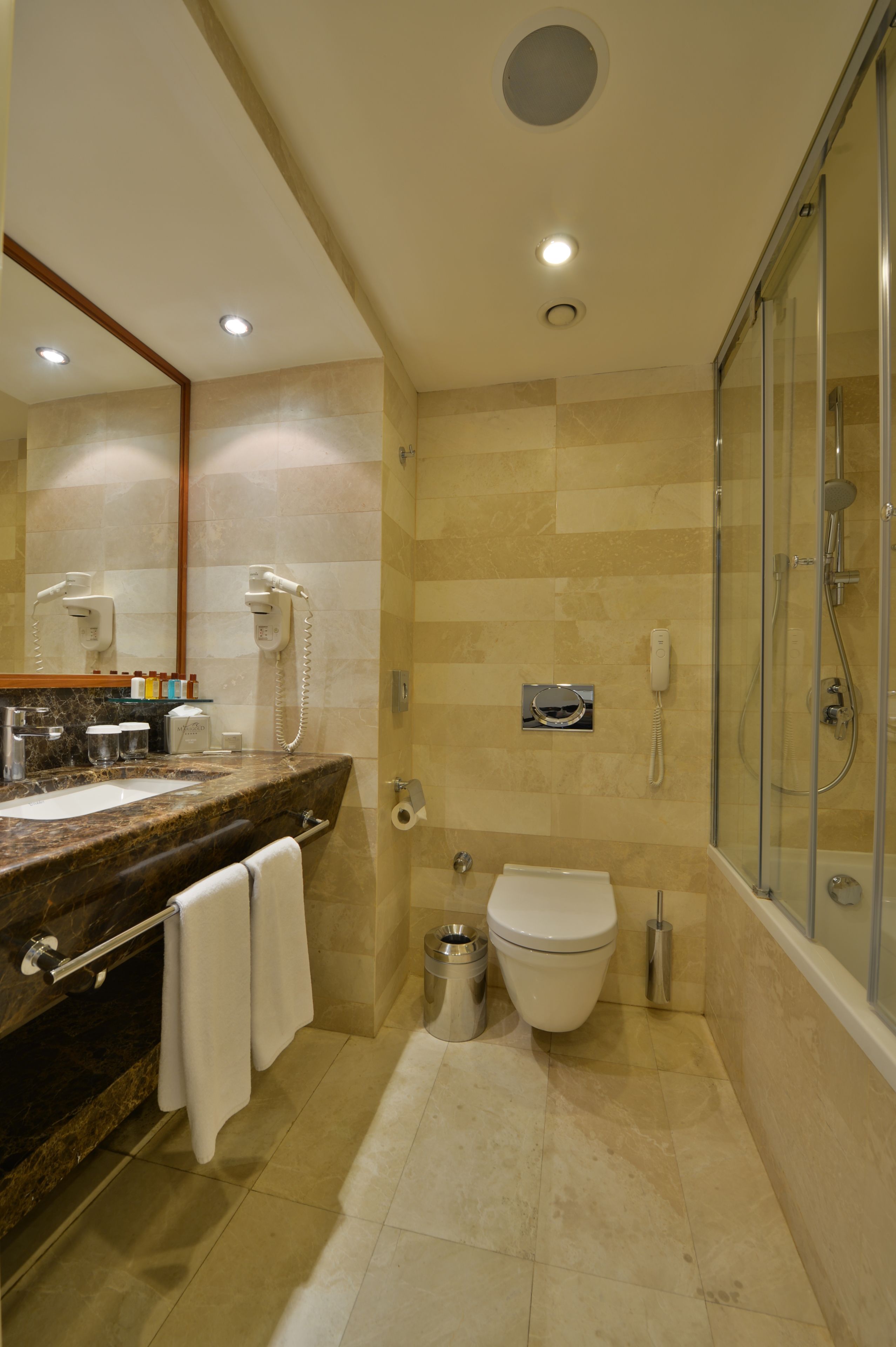 deep-soaking bathtub, free toiletries, hair dryer, bathrobes