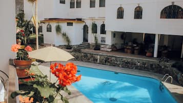 Outdoor pool, open 9 AM to 7:00 PM, sun loungers