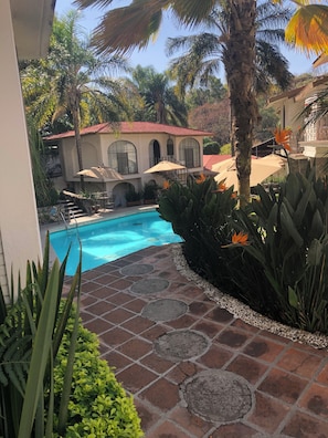 Outdoor pool, open 9 AM to 7:00 PM, sun loungers