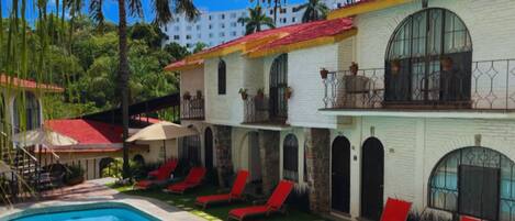 Outdoor pool, open 9 AM to 7:00 PM, sun loungers