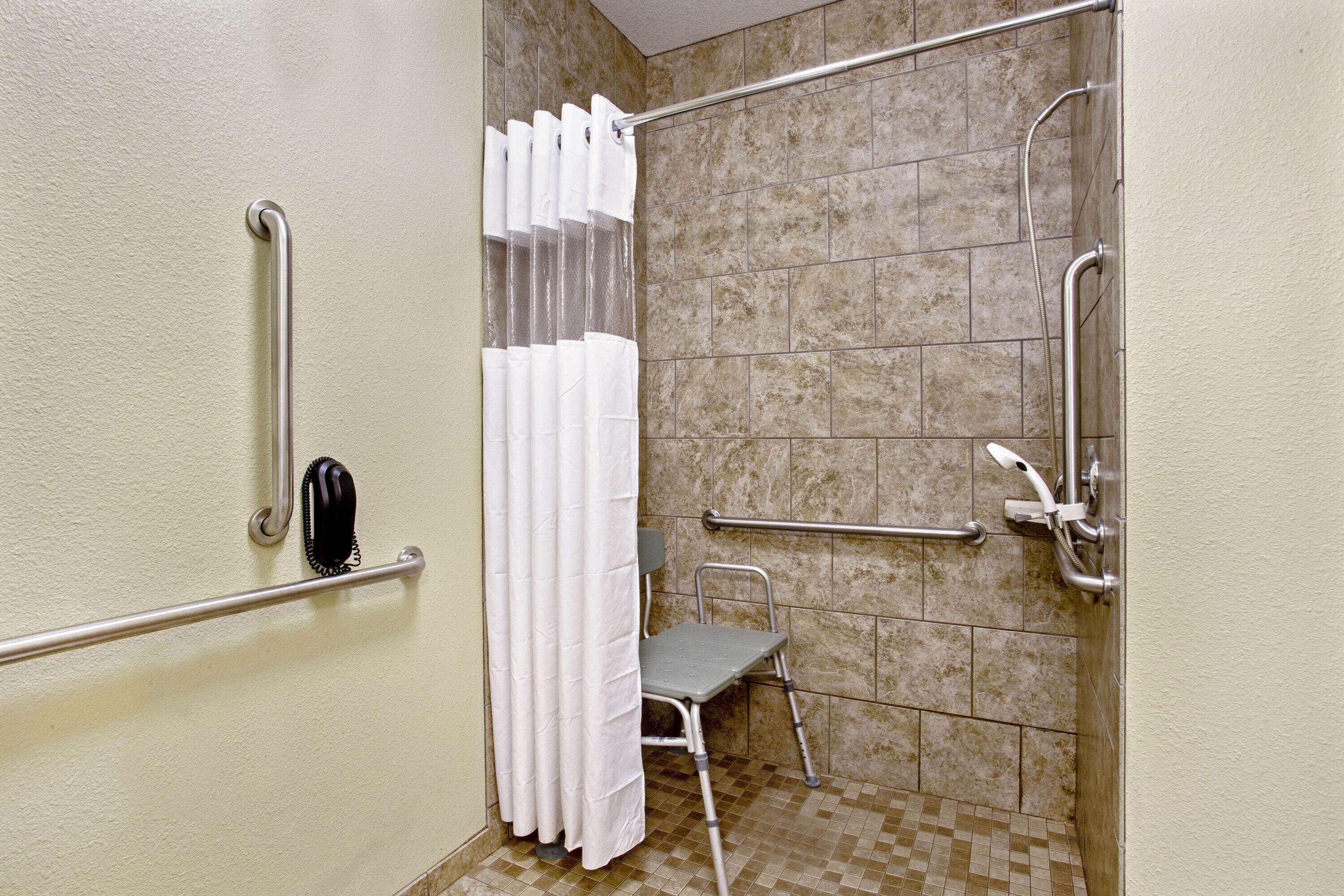 combined shower/bathtub, free toiletries, hair dryer, towels