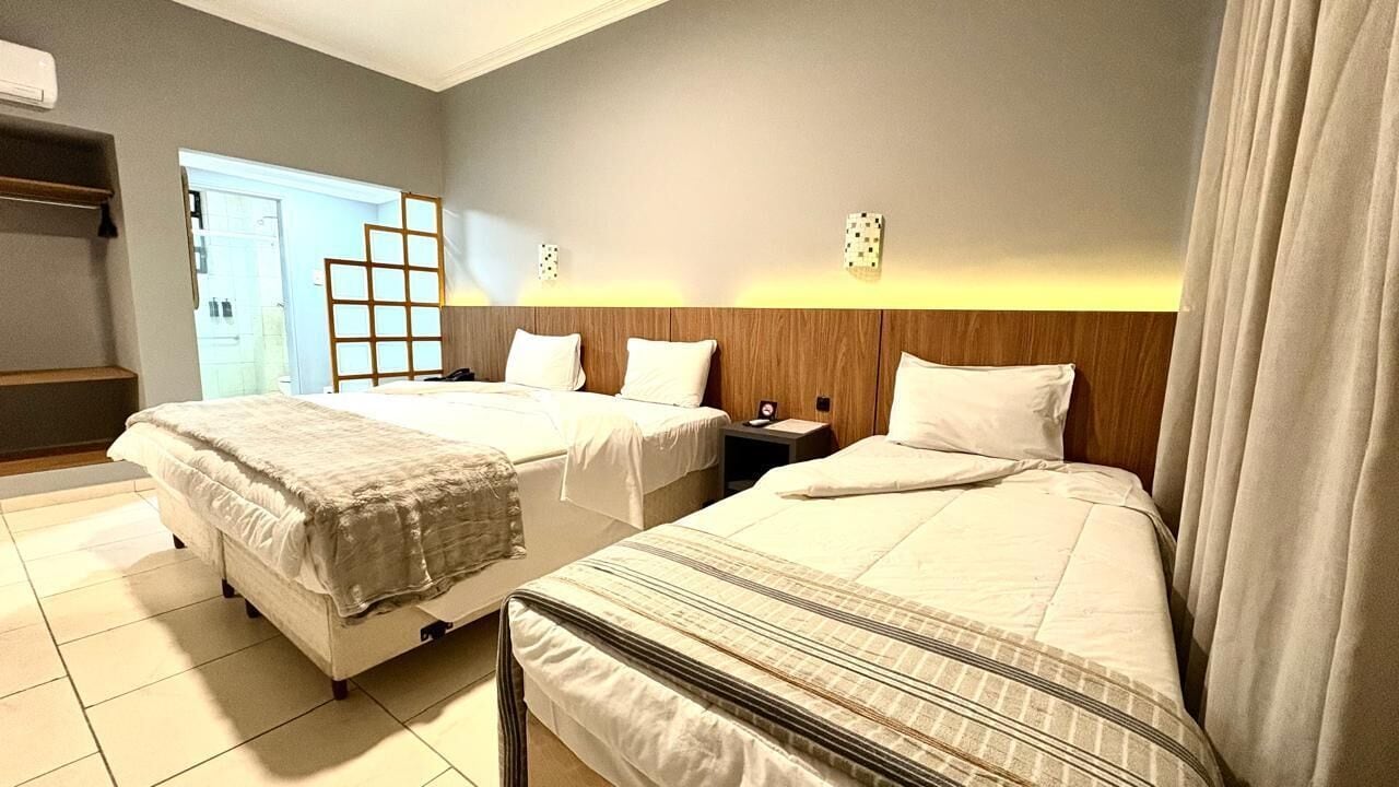Deluxe Family Suite | Minibar, in-room safe, free WiFi, bed sheets