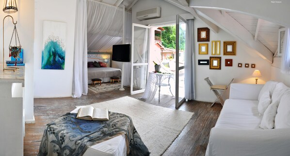 Suíte Luxo (com banheira de Hidromassagem ou Ofurô) | Minibar, una cassaforte in camera, tende oscuranti, Wi-Fi gratuito