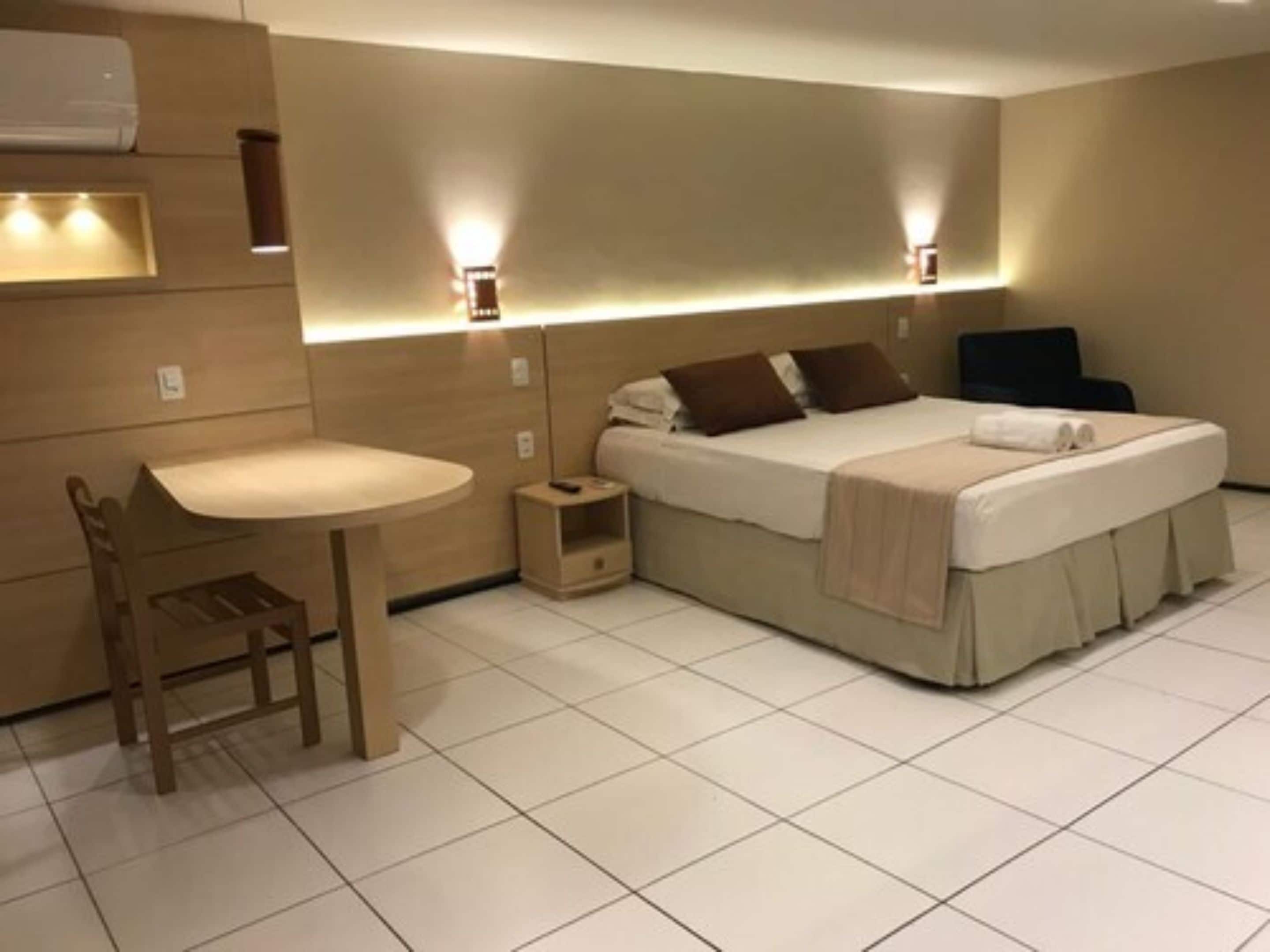 deluxe room | minibar, individually decorated, desk, laptop workspace