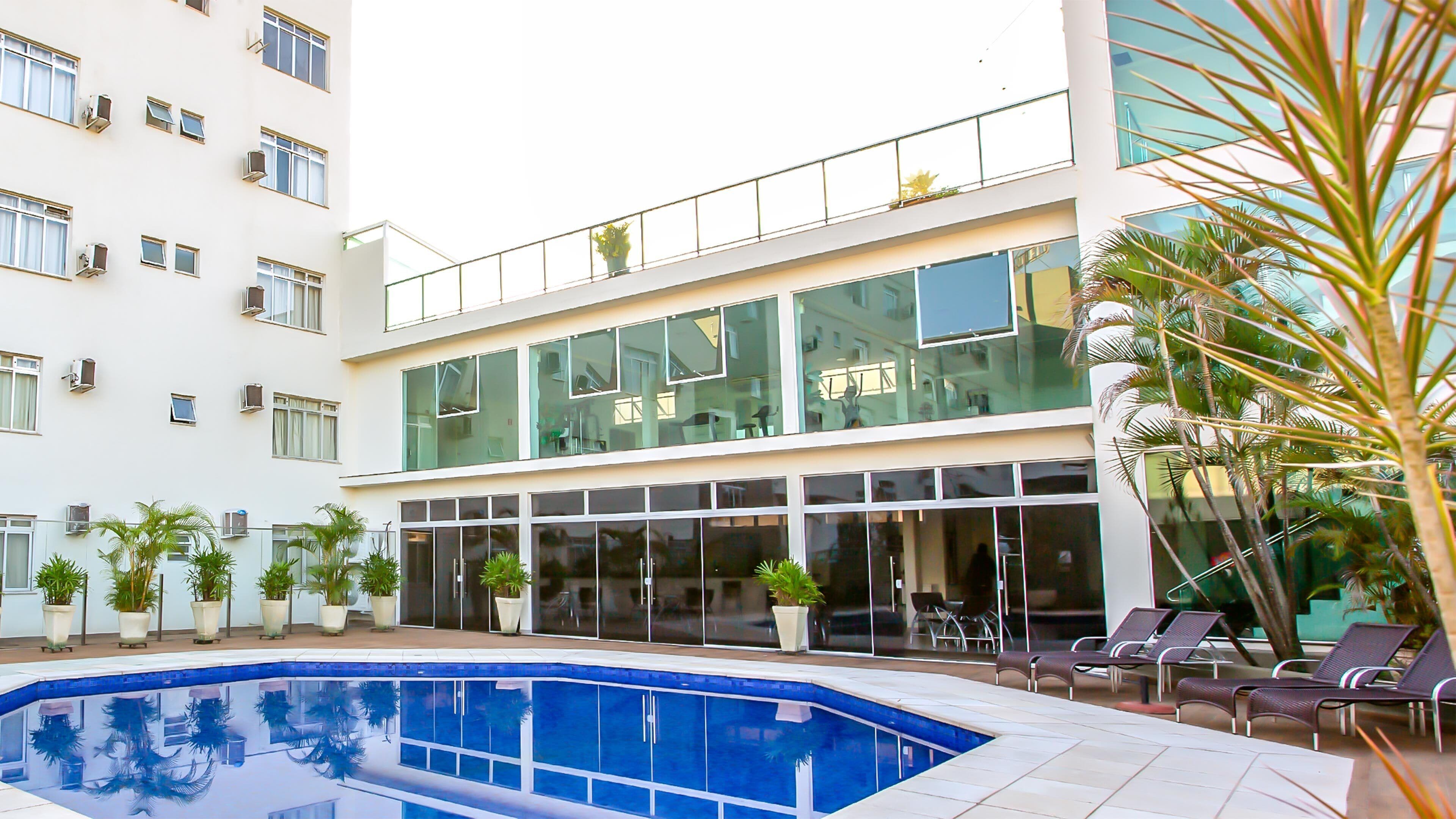 outdoor pool, pool umbrellas, pool loungers