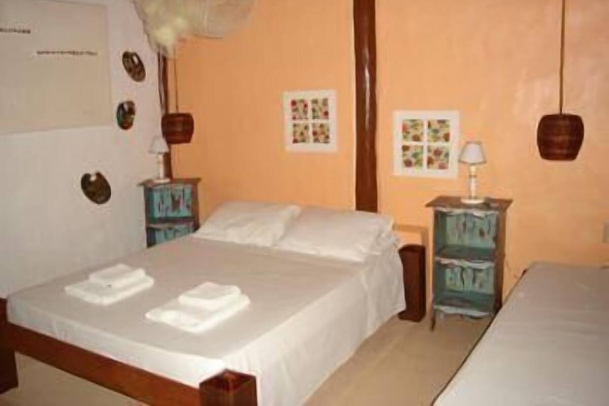 Habitación cuádruple | Minibar, camas supletorias, wifi gratis y decoración individual