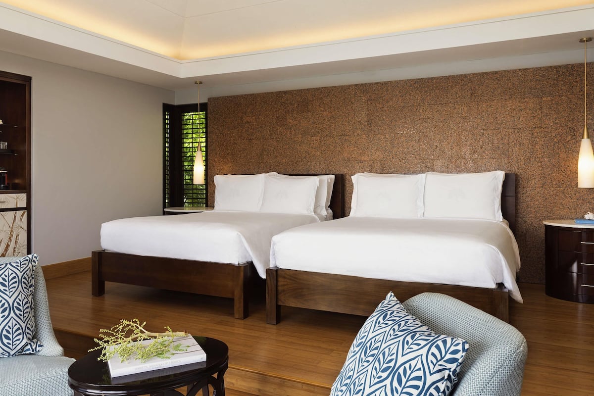 Premium bedding, down comforters, Tempur-Pedic beds, minibar