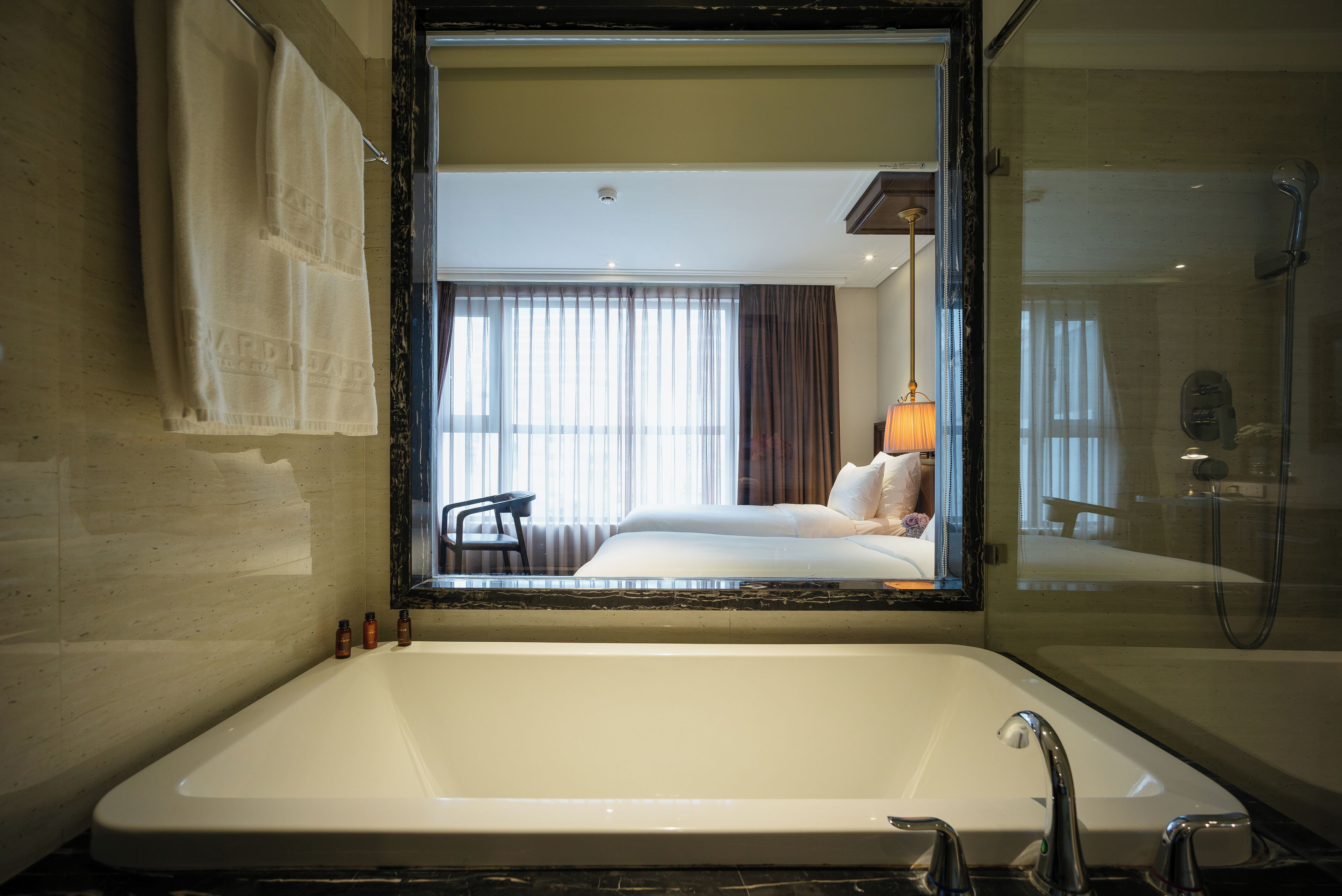 classic wing twin room | bathroom | designer toiletries, hair dryer, bathrobes, slippers