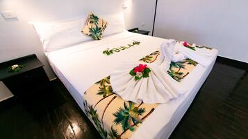 Chambre Deluxe, vue mer (Bure,children 2 years above) | Coffres-forts dans les chambres, fer et planche Ă repasser