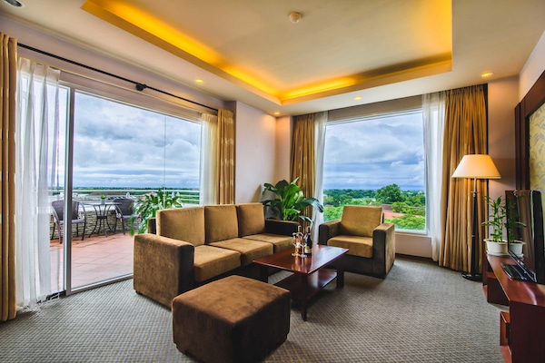 Panoramic Suite, River View | Minibar, in-room safe, desk, blackout drapes