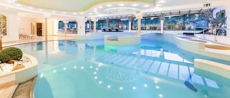 Indoor pool, seasonal outdoor pool, open 7 AM to 7:30 PM, pool umbrellas