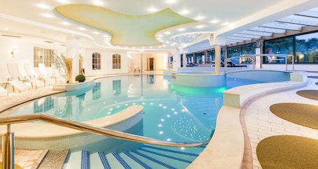 Indoor pool, seasonal outdoor pool, open 7 AM to 7:30 PM, pool umbrellas. Royal Hotel Hinterhuber