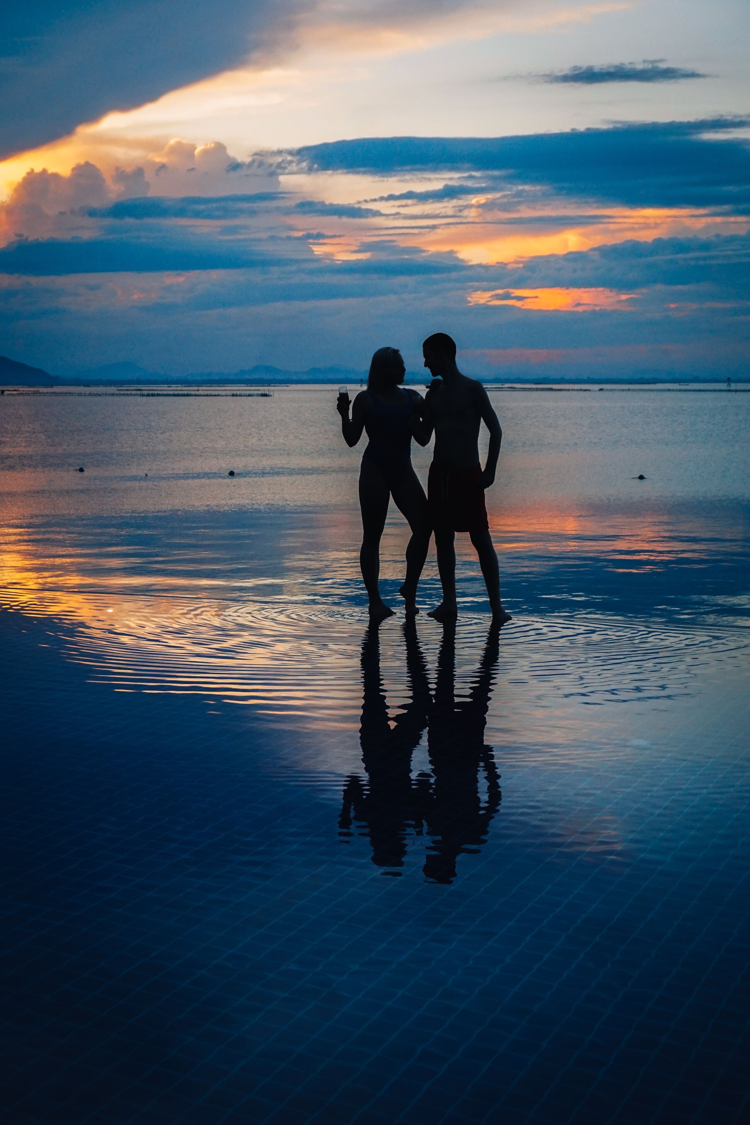 indoor pool, outdoor pool, pool umbrellas, pool loungers