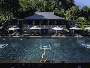 Indoor pool, outdoor pool, pool umbrellas, pool loungers