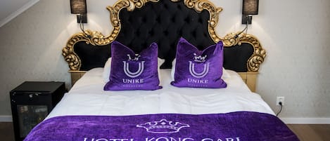 Ropa de cama de alta calidad, minibar y escritorio