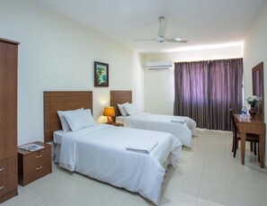 Studio (Apartment Double) | In-room safe, blackout curtains, iron/ironing board, cots/infant beds