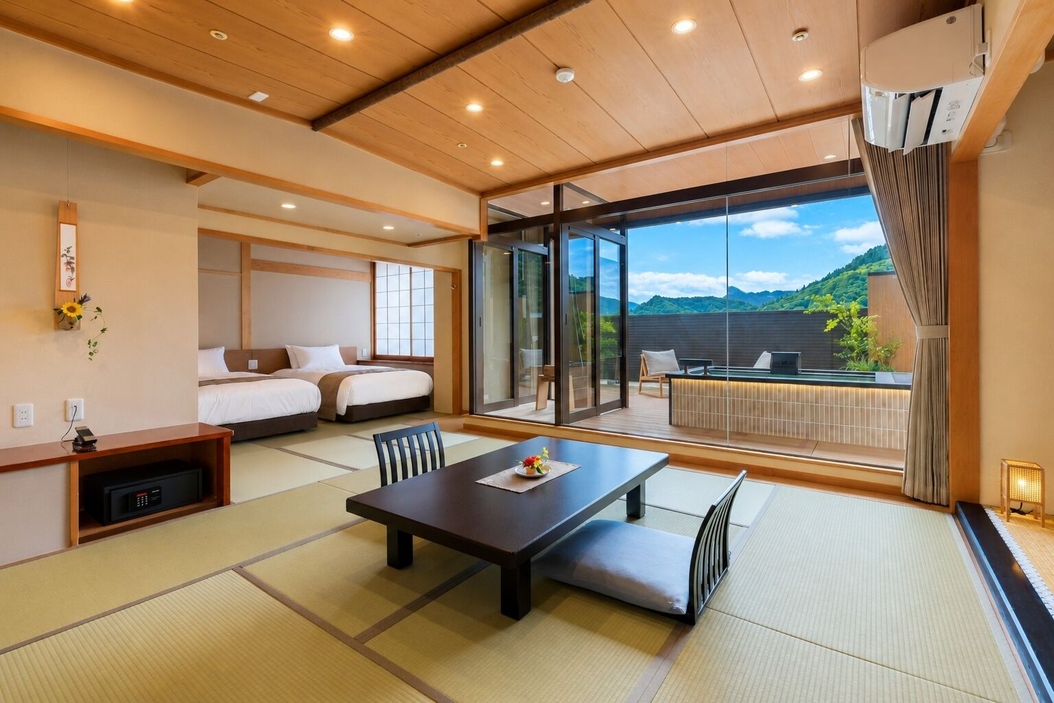 A modern hotel room with tatami flooring, a large sliding glass door to a balcony, and a view of a mountainous landscape.